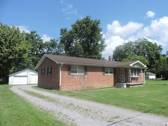 517 Milliken Rd, Paducah, KY 42003 - single story home featuring brick siding, a front lawn, an outbuilding, crawl space, and a detached garage