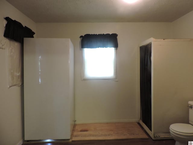 517 Milliken Rd, Paducah, KY 42003 - full bathroom featuring a shower and wood finished floors