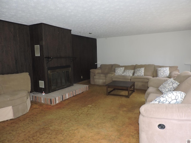 517 Milliken Rd, Paducah, KY 42003 - living area featuring carpet flooring, a fireplace, and a textured ceiling