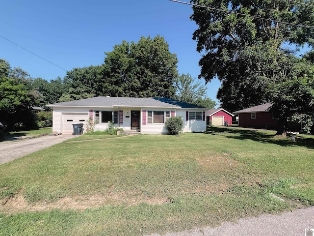 524 S Seminary St, Princeton, KY 42445 - single story home with an attached garage, concrete driveway, and a front lawn