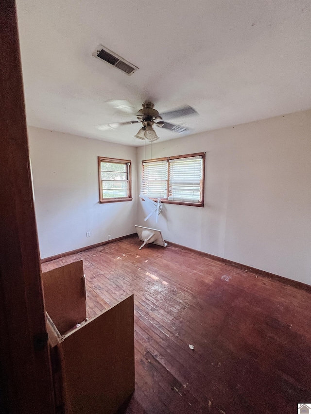 524 S Seminary St, Princeton, KY 42445 - spare room featuring wood-type flooring and a ceiling fan