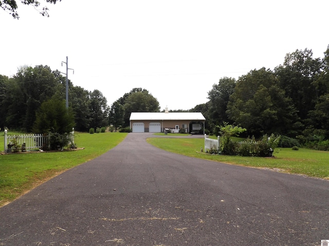 907 State Route 819 N, Kuttawa, KY 42055 - single story home featuring a garage and a front yard