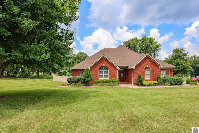 329 Royal Park Dr, Calvert City, KY 42029 - single story home featuring a front lawn and brick siding