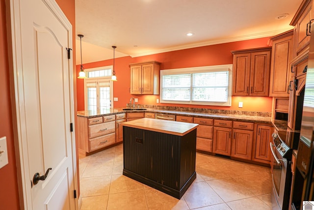329 Royal Park Dr, Calvert City, KY 42029 - kitchen with butcher block countertops, a kitchen island, a peninsula, plenty of natural light, and crown molding