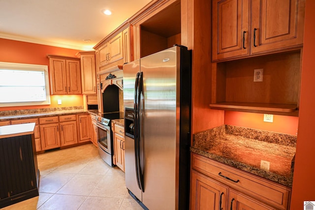 329 Royal Park Dr, Calvert City, KY 42029 - kitchen with stainless steel appliances, ornamental molding, light tile patterned floors, open shelves, and dark stone counters