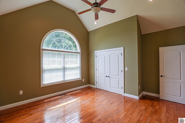 329 Royal Park Dr, Calvert City, KY 42029 - unfurnished bedroom featuring high vaulted ceiling, light wood-style flooring, a closet, ceiling fan, and recessed lighting