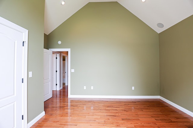 329 Royal Park Dr, Calvert City, KY 42029 - unfurnished room featuring high vaulted ceiling, light wood finished floors, and recessed lighting