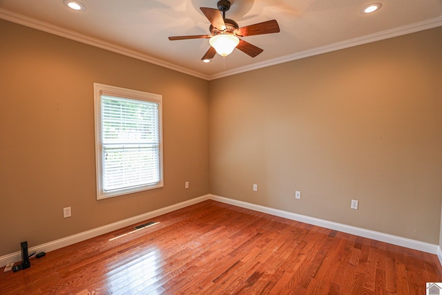 329 Royal Park Dr, Calvert City, KY 42029 - unfurnished room with a ceiling fan, wood finished floors, recessed lighting, and ornamental molding