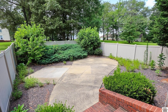 329 Royal Park Dr, Calvert City, KY 42029 - fenced backyard featuring a patio