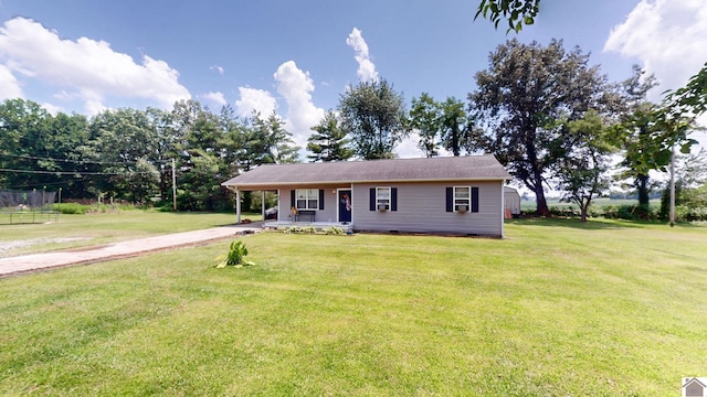 233 Bendefield Ln, Farmington, KY 42040 - view of front of house with a porch, driveway, a front lawn, and an attached carport