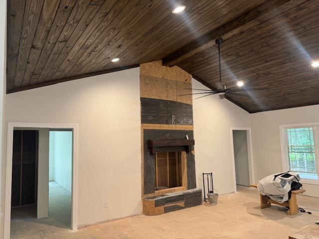 104 Water District Rd, Cadiz, KY 42211 - unfurnished living room featuring wooden ceiling, recessed lighting, a ceiling fan, and a large fireplace