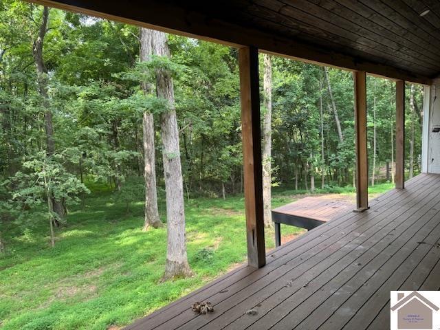 104 Water District Rd, Cadiz, KY 42211 - wooden deck with a lawn