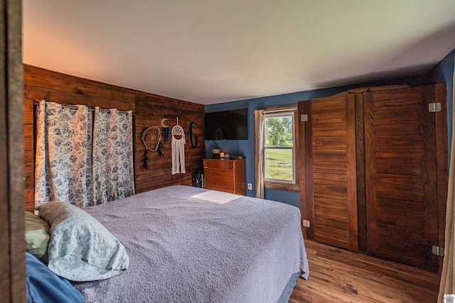 353 Creswell Rd, Princeton, KY 42445 - bedroom with wood finished floors and wooden walls