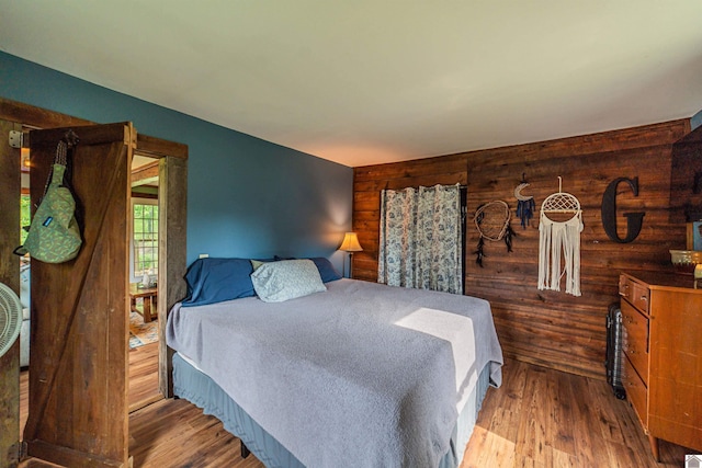 353 Creswell Rd, Princeton, KY 42445 - bedroom featuring wood finished floors and wood walls