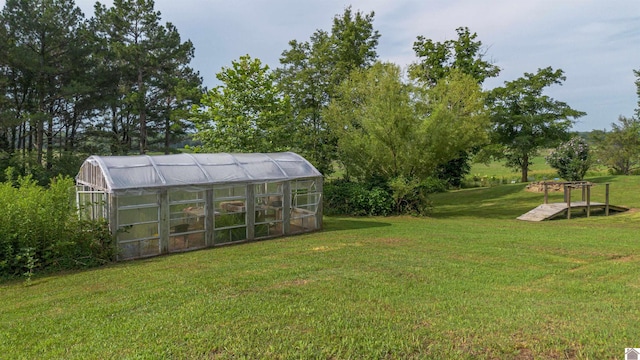 353 Creswell Rd, Princeton, KY 42445 - view of green lawn featuring an exterior structure and an outbuilding