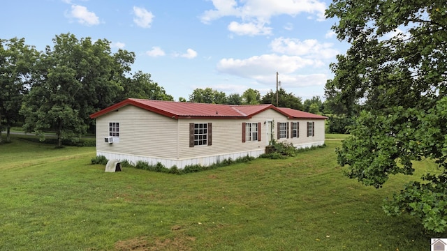 520 Seay Graveyard Rd, Sedalia, KY 42079 - view of front of home with a front yard, a metal roof, and cooling unit