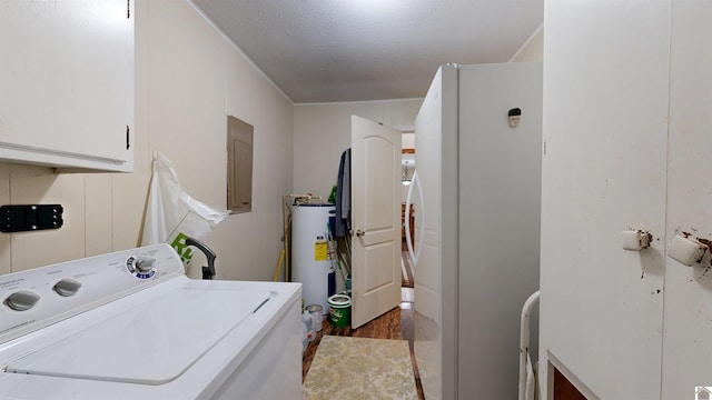 152 State Route 94 W, Sedalia, KY 42079 - washroom featuring washer / clothes dryer, water heater, cabinet space, and electric panel