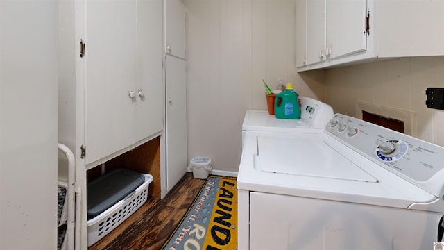 152 State Route 94 W, Sedalia, KY 42079 - laundry area featuring cabinet space, washing machine and clothes dryer, and dark wood-type flooring
