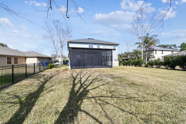 view of yard with a sunroom