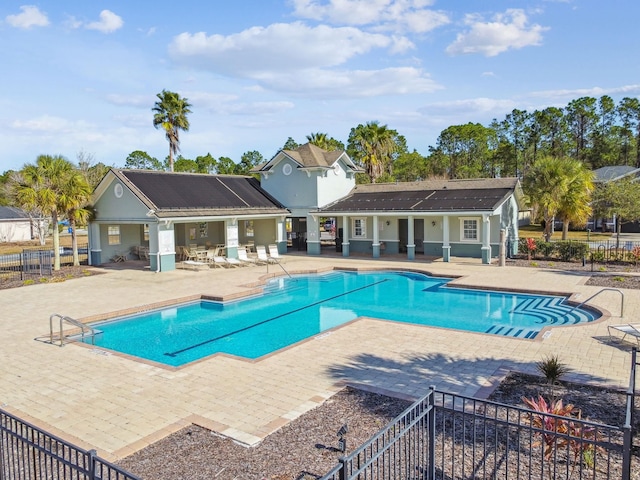 view of swimming pool featuring a patio area