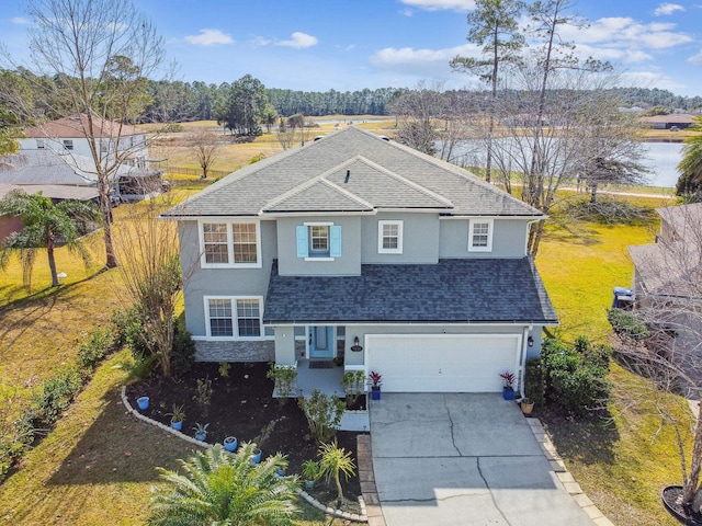 front of property with a garage