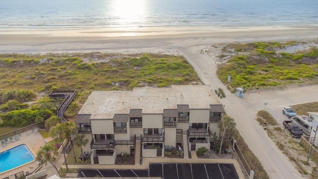 aerial view with a view of the beach and a water view