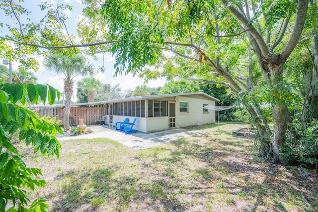 back of property featuring a patio