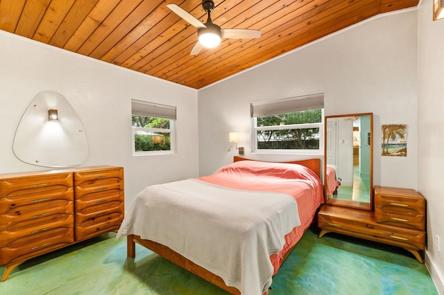 carpeted bedroom featuring wood ceiling, multiple windows, and vaulted ceiling