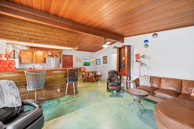 living room with vaulted ceiling with beams, wooden ceiling, and concrete flooring