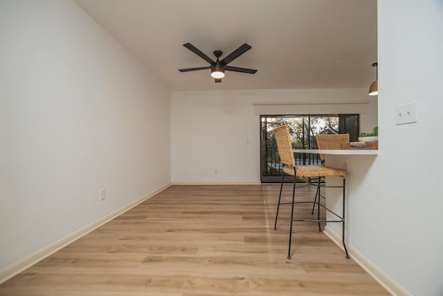 interior space featuring light hardwood / wood-style floors and ceiling fan