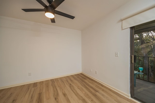 spare room featuring ceiling fan and light wood-type flooring