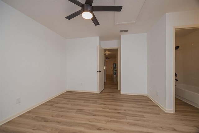 unfurnished bedroom with light wood-type flooring and ceiling fan