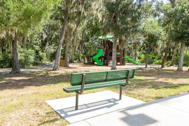 view of home's community featuring a playground