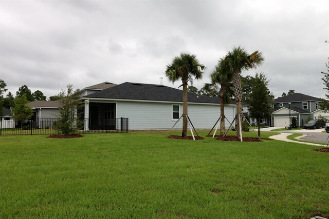 exterior space with a yard