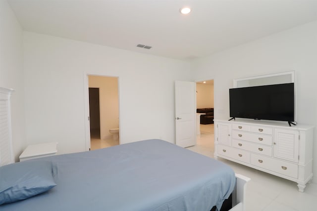 bedroom featuring ensuite bathroom