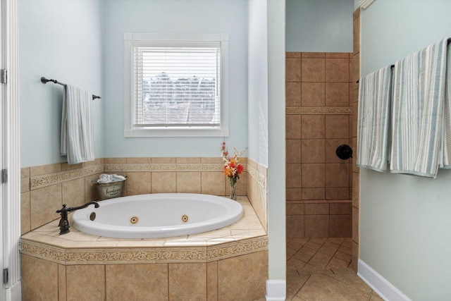 bathroom featuring tile patterned flooring and plus walk in shower