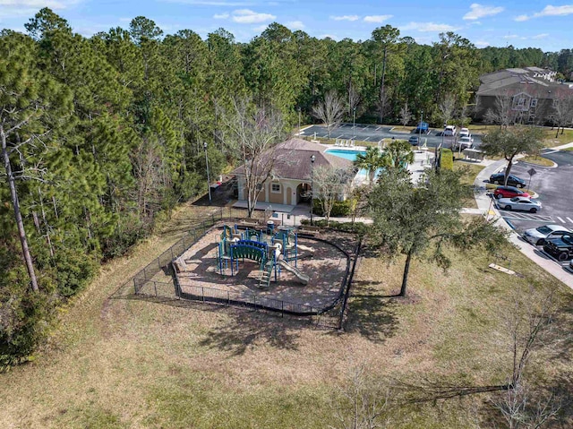 exterior space with playground community and fence