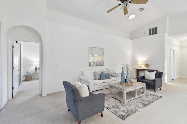 581 Boxwood Pl, Saint Augustine, FL 32086 - living area with light colored carpet, ceiling fan, and high vaulted ceiling