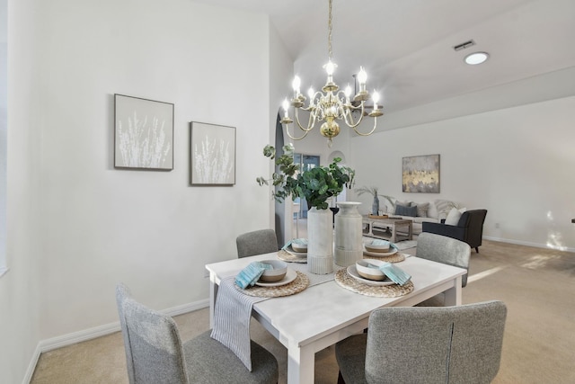 581 Boxwood Pl, Saint Augustine, FL 32086 - dining space featuring light colored carpet and a chandelier