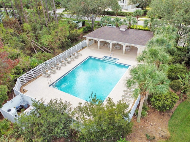 581 Boxwood Pl, Saint Augustine, FL 32086 - community pool with stairs, a fenced backyard, a gazebo, and a patio area