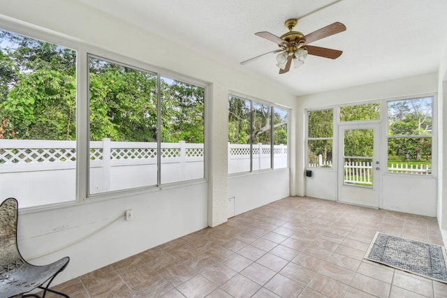 581 Boxwood Pl, Saint Augustine, FL 32086 - unfurnished sunroom featuring a ceiling fan