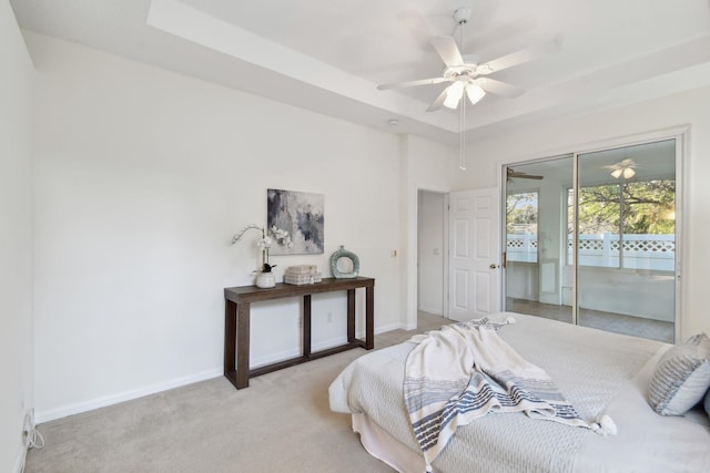 581 Boxwood Pl, Saint Augustine, FL 32086 - bedroom featuring light carpet, a ceiling fan, a raised ceiling, and a closet