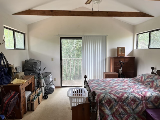 bedroom featuring vaulted ceiling with beams and multiple windows