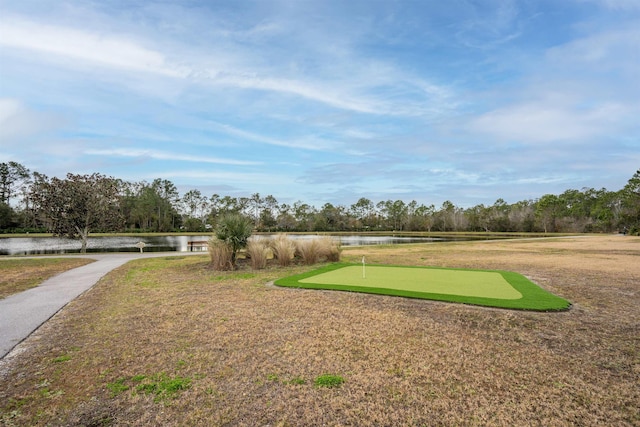 surrounding community with a water view