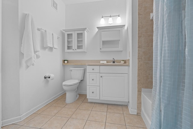 full bathroom featuring tile patterned floors, toilet, vanity, and shower / bath combination with curtain