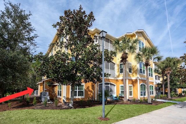 view of property featuring central AC