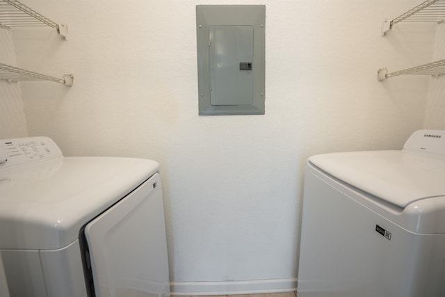 laundry room featuring independent washer and dryer and electric panel