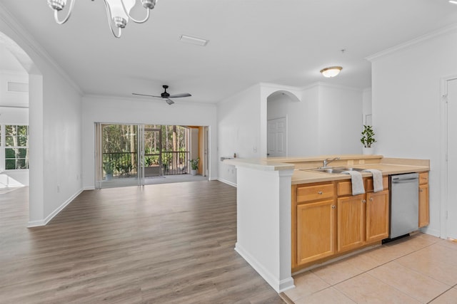 kitchen with sink, light wood-type flooring, ceiling fan, stainless steel dishwasher, and ornamental molding