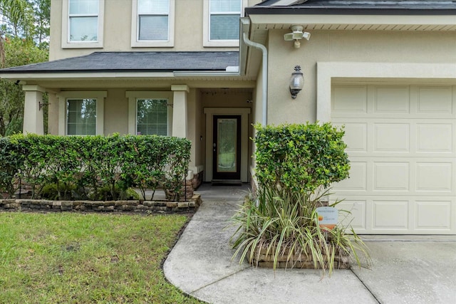 doorway to property featuring a garage