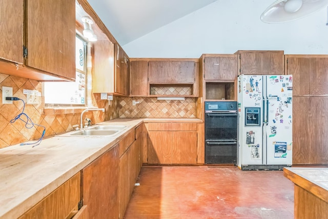 19 Casanova Rd, Saint Augustine, FL 32080 - kitchen featuring white refrigerator with ice dispenser, a sink, vaulted ceiling, open shelves, and light countertops